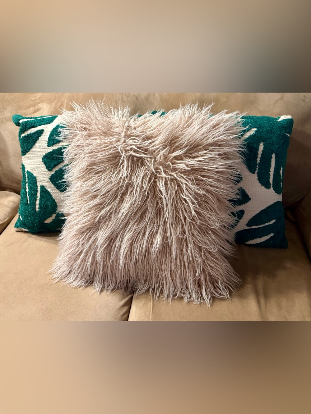 Set of three decorative throw pillows